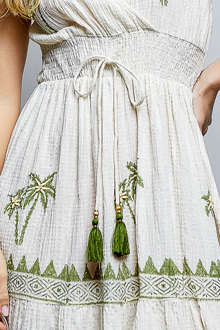 coastal fashion
beach chic dress
island-inspired dress
tropical resort wear
vacation wardrobe
tropical island vacation outfit
coastal-inspired summer dress
white and green tropical dress
embroidered palm tree vacation outfit
breezy summer resort dress
beach getaway dress for women

