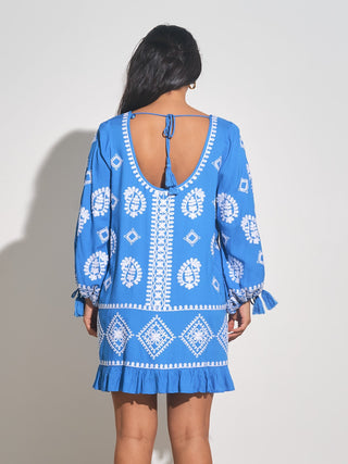 Featuring 3/4 length sleeves and a scoop neck and back, the Roche Dress is both elegant and comfortable