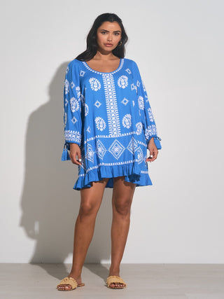 Featuring 3/4 length sleeves and a scoop neck and back, the Roche Dress is both elegant and comfortable