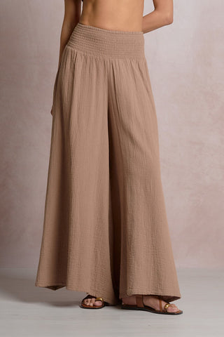 breezy cotton pants
lightweight cotton pant
resort‑ready pants
smocked waist palazzo
wide‑leg silhouette
vacation outfit pants
casual summer pants
relaxed fit pants