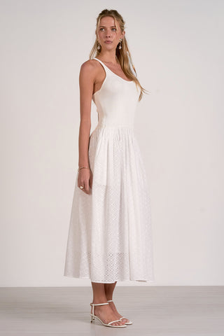 white embroidered midi dress
romantic ivory dress for summer
white resort wear midi dress
sleeveless eyelet dress for beach vacation
ivory dress for brunch and summer events